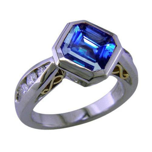 Anello in oro bicolore con tanzanite radiante e diamanti 3.75 carati - harrychadent.it