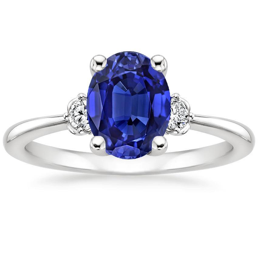 Anello con tre pietre di diamanti e zaffiro ovale di Ceylon 3.50 carati in oro bianco - harrychadent.it