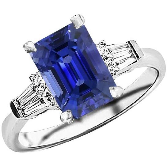 Anello con zaffiro dello Sri Lanka rotondo e baguette. taglio smeraldo. 4 carati - harrychadent.it
