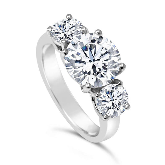 Anello di fidanzamento in oro bianco con tre diamanti a taglio rotondo e tre pietre da 4 carati - harrychadent.it