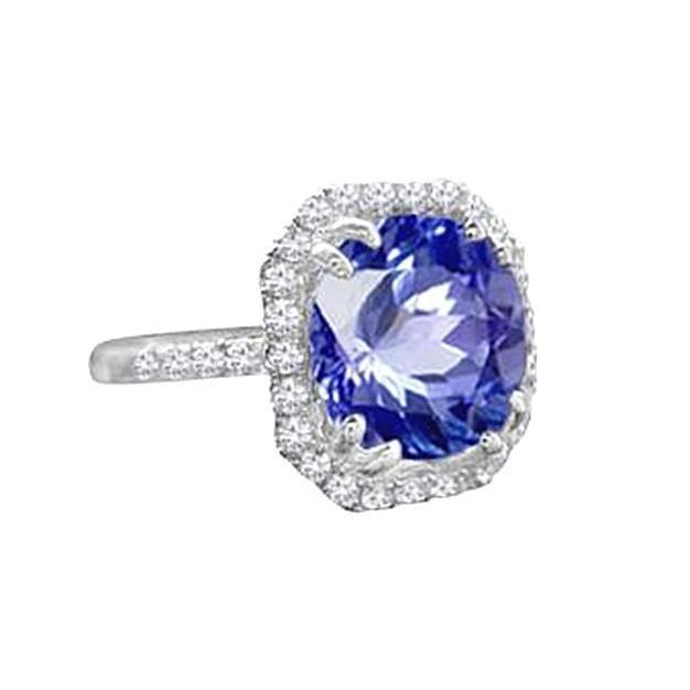 Anello in oro bianco 14 carati con diamanti 8 carati e zaffiro di Ceylon - harrychadent.it