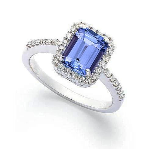 Anello in oro bianco 14 carati con tanzanite e diamanti incastonati 5.80 ct - harrychadent.it