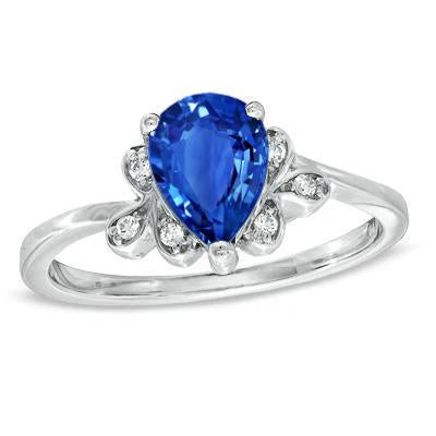 Anello in oro bianco 14 carati con zaffiro di Ceylon e diamanti da 2,30 carati - harrychadent.it