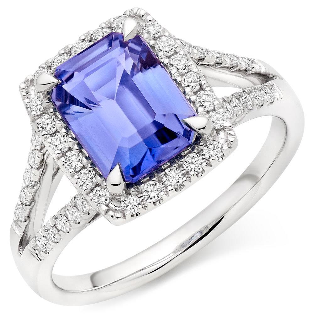 Anello in oro bianco 14 kt con tanzanite blu da 6.85 ct con diamanti - harrychadent.it