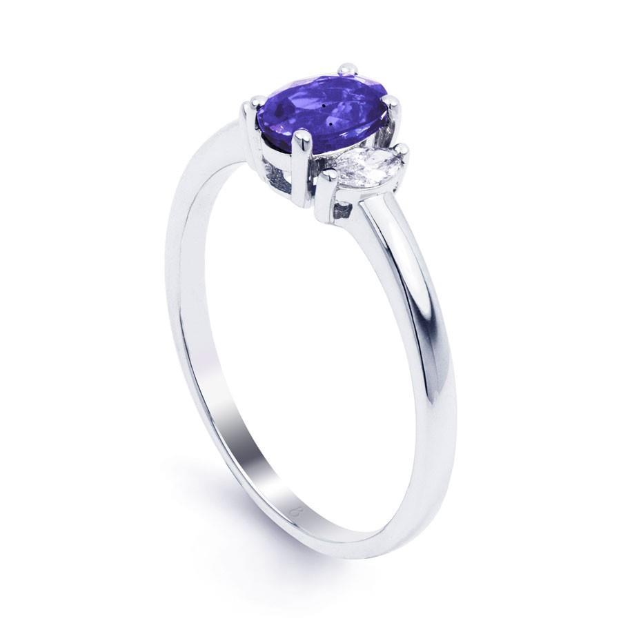 Anello in oro bianco 14 kt con tre pietre di tanzanite e diamanti da 3.50 carati - harrychadent.it