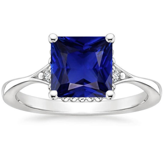 Anello in oro con 3 pietre. diamanti e zaffiro blu. gambo diviso 5.25 carati - harrychadent.it