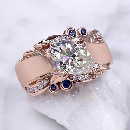 Anello in oro rosa con diamanti. 2.25 carati. gioielli con accenti di zaffiro di Ceylon - harrychadent.it