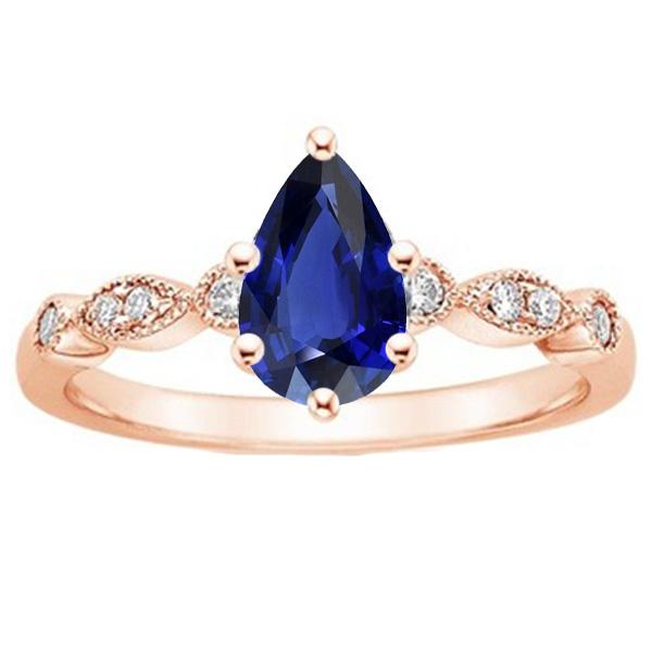 Anello in oro rosa con zaffiro stile vintage pera e diamanti tondi 4 carati - harrychadent.it