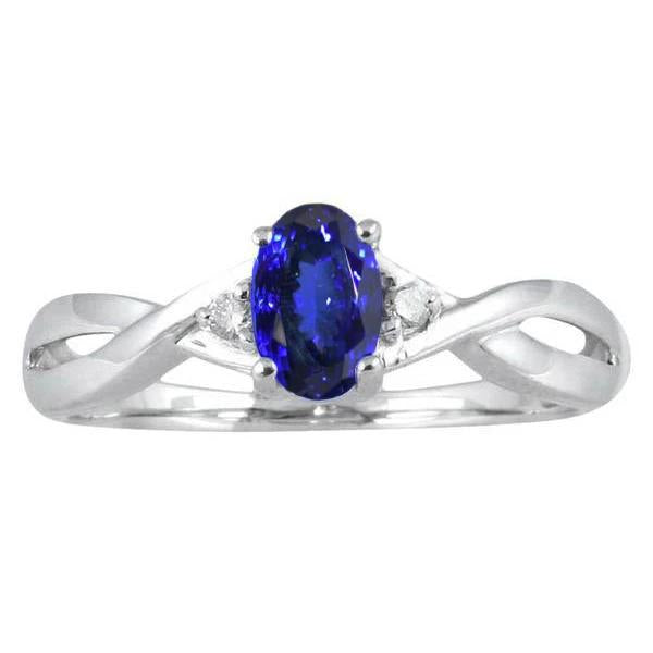 Anello in stile antico con tanzanite ovale e diamanti tondi da 1,60 carati e bianco 14 carati - harrychadent.it