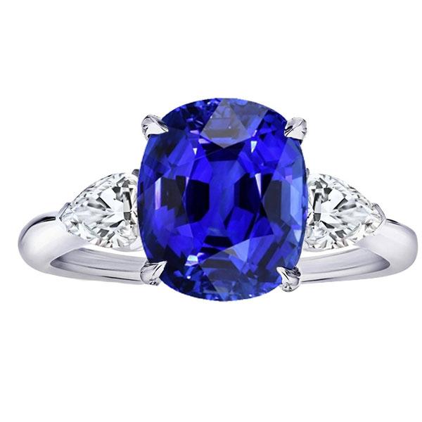 Anello ovale con 3 pietre. zaffiro blu e diamanti a pera. 4.50 carati - harrychadent.it