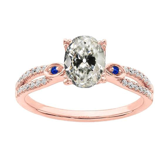 Anello ovale con diamanti a taglio antico e zaffiro rotondo dello Sri Lanka 4.50 carati - harrychadent.it