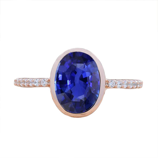 Anello solitario con zaffiro blu lunetta con diamanti in oro 3.50 carati