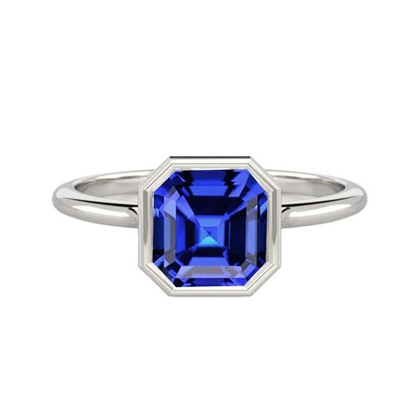 Anello solitario in oro bianco con castone Asscher incastonato zaffiro blu 2 carati - harrychadent.it
