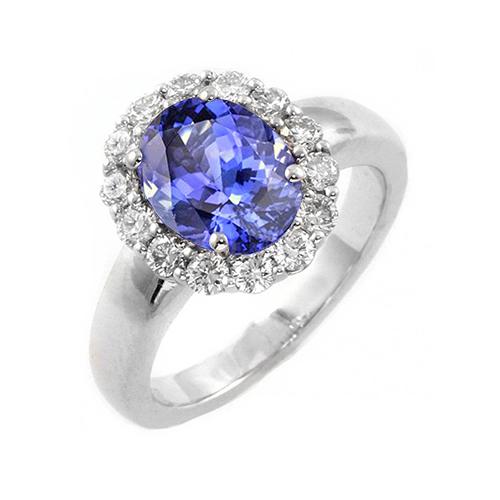 Fede nuziale in oro bianco 14 kt con tanzanite ovale da 7.50 ct con diamanti - harrychadent.it