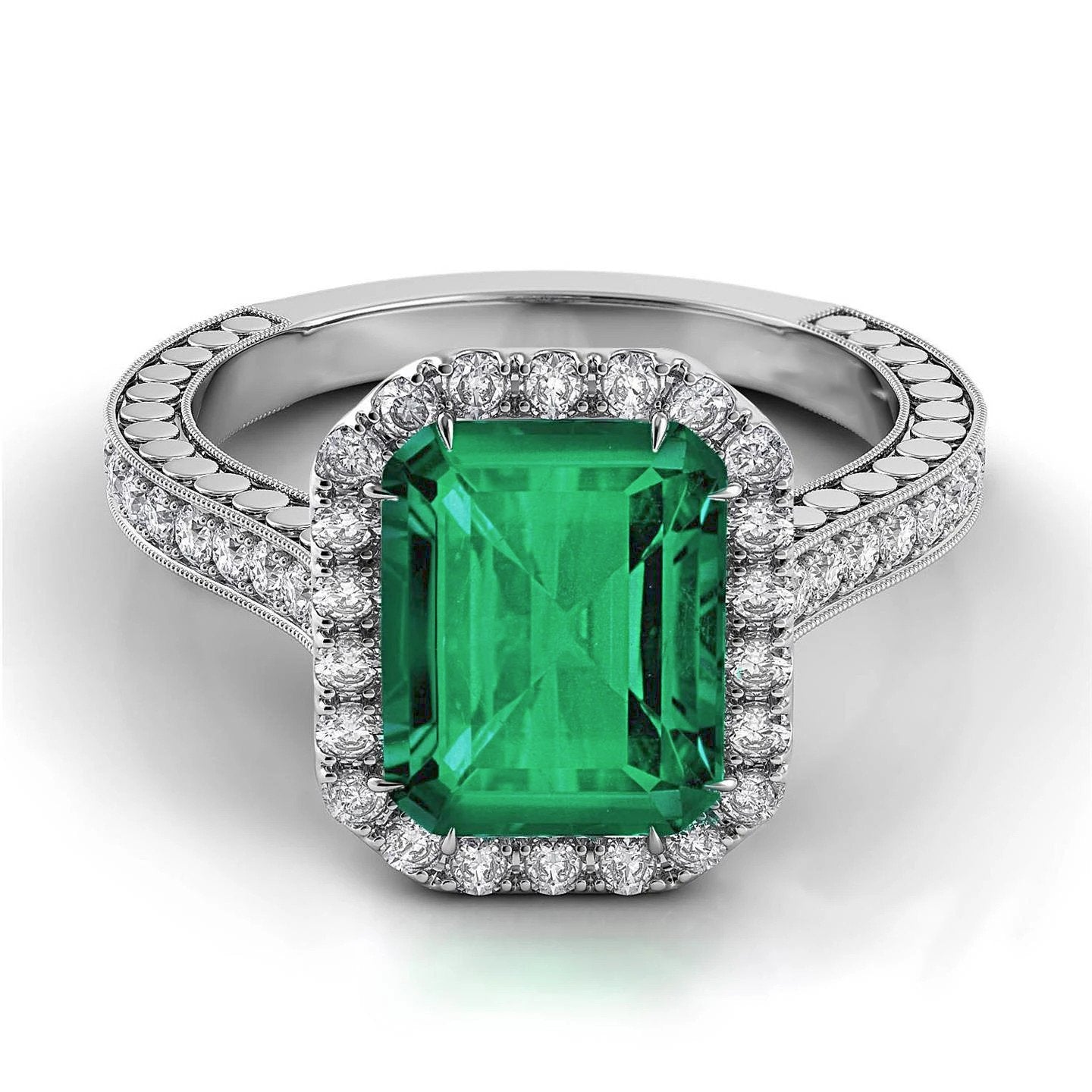 Fede nuziale in oro bianco con diamanti e smeraldo verde 21.50 ct - harrychadent.it