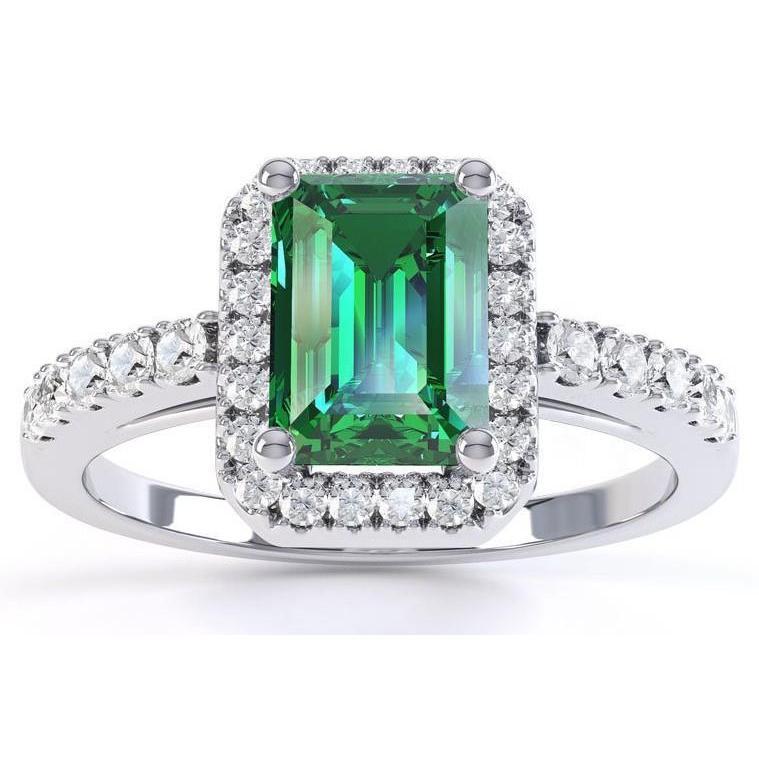 Fede nuziale in oro bianco con smeraldo verde e diamanti da 4.40 carati - harrychadent.it