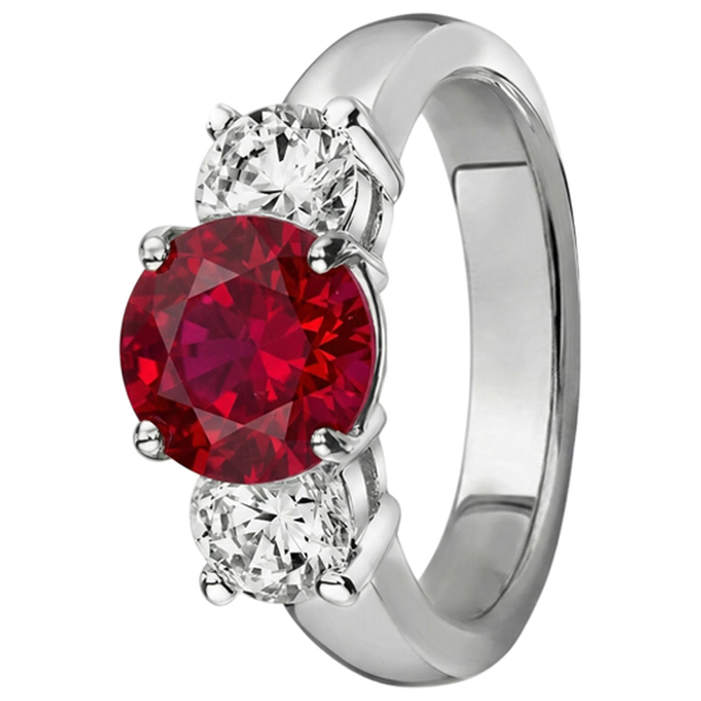 3,50 ct. Anello con 3 pietre di rubini e diamanti incastonato a griffe in oro bianco