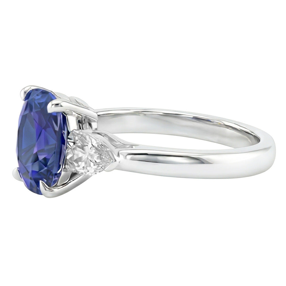 Anello 3 carati con diamante. pera e zaffiro blu ovale. 3 carati. gioielli da donna