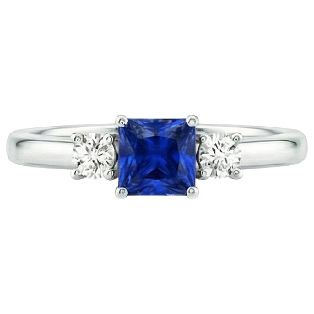 Anello Anniversary con diamante tondo e zaffiro principessa blu da 1,25 carati e oro bianco 14K