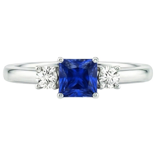 Anello Anniversary con diamante tondo e zaffiro principessa blu da 1,25 carati e oro bianco 14K