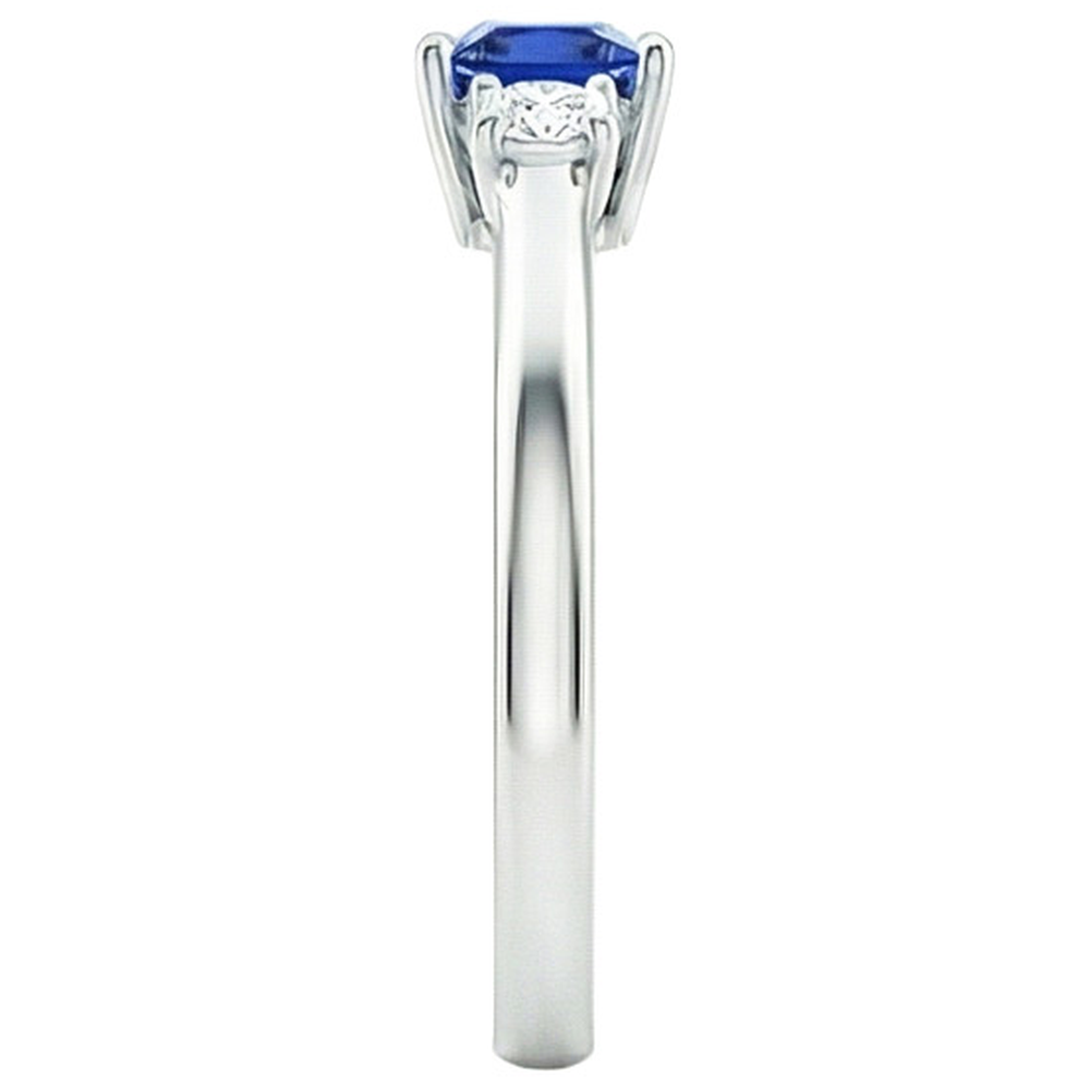 Anello Anniversary con diamante tondo e zaffiro principessa blu da 1,25 carati e oro bianco 14K