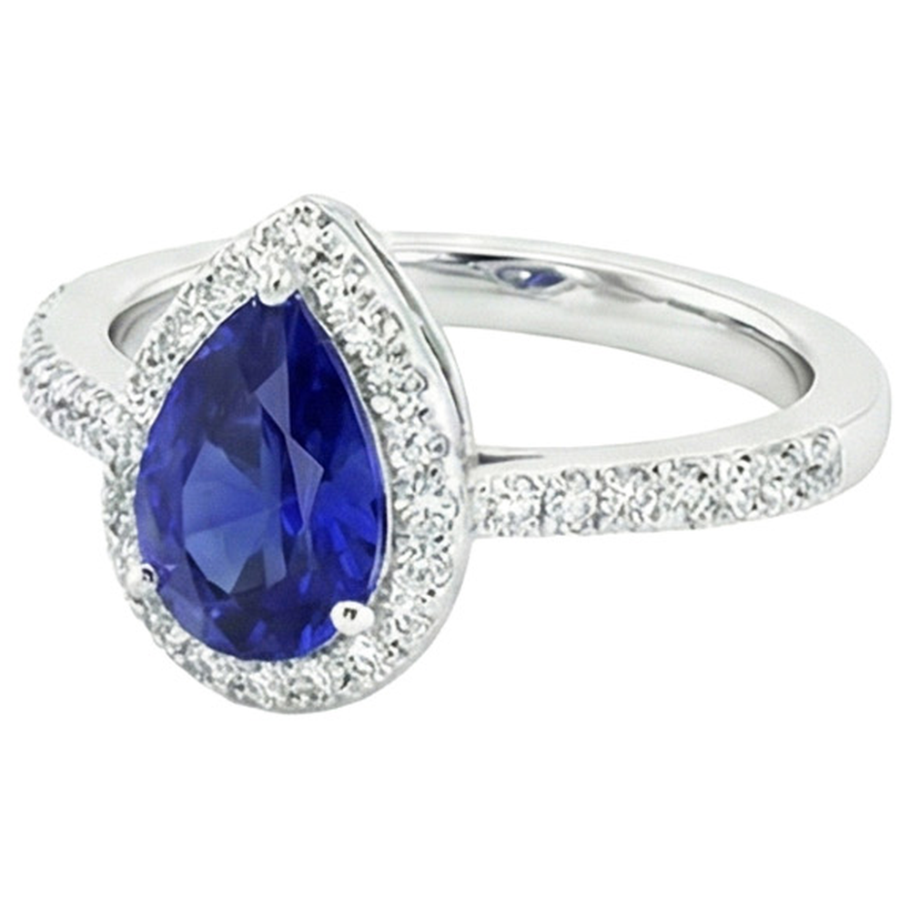 Anello Halo Pera Zaffiro di Ceylon e pavé di diamanti 4.50 carati