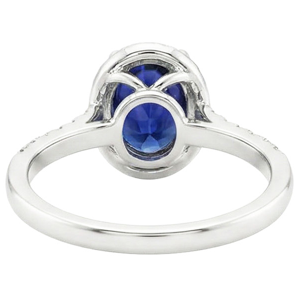 Anello Halo con diamante a taglio ovale con zaffiro dello Sri Lanka da 4 carati