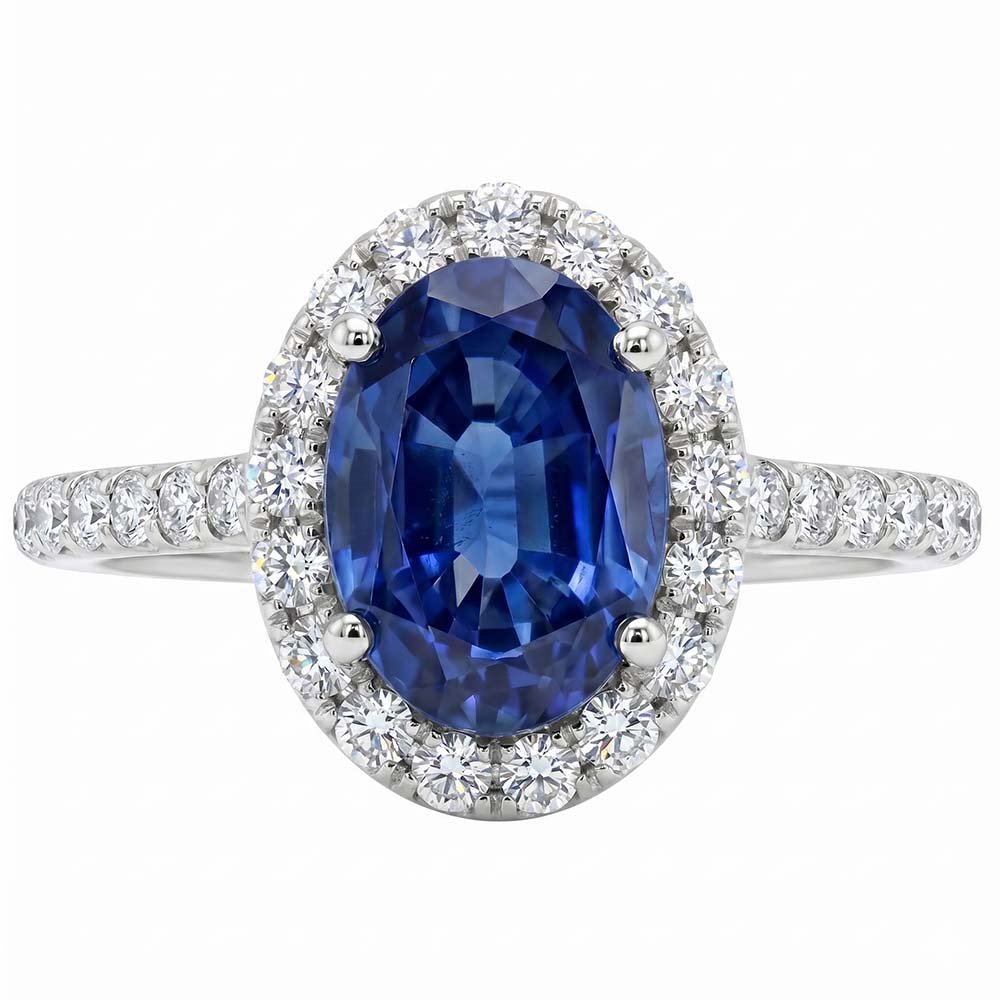 Anello Halo con diamante ovale. zaffiro blu accentato. oro bianco 5.50 carati