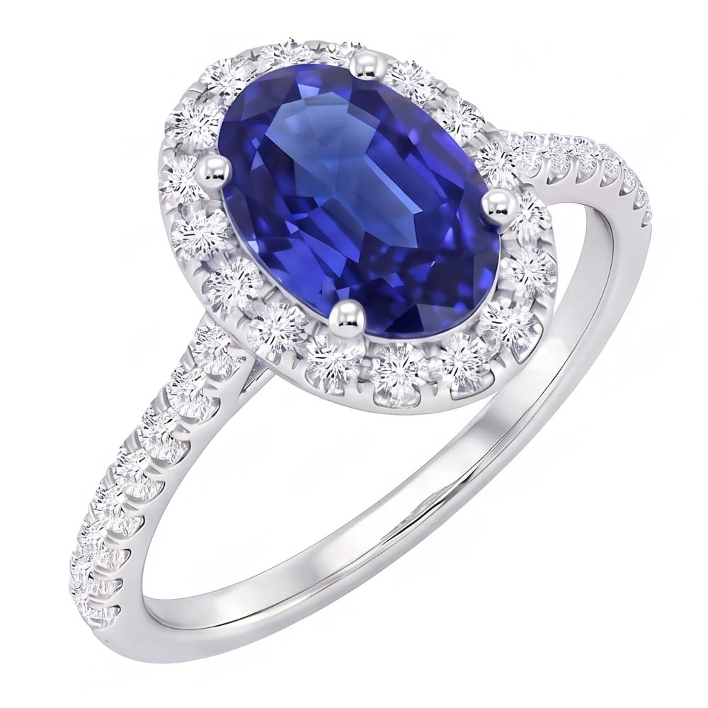 Anello Halo con diamante ovale. zaffiro blu accentato. oro bianco 5.50 carati