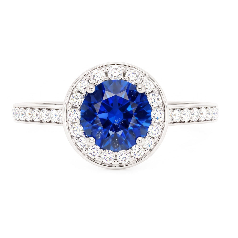 Anello Halo con diamante rotondo. zaffiro di Ceylon. 4 carati. accenti in oro bianco