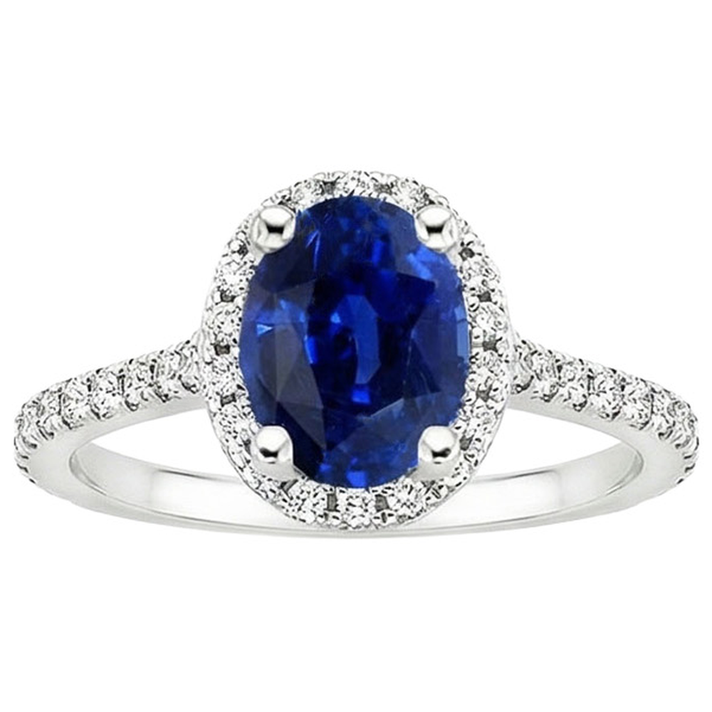 Anello Halo con pavé di diamanti e zaffiro ovale dello Sri Lanka 5 carati