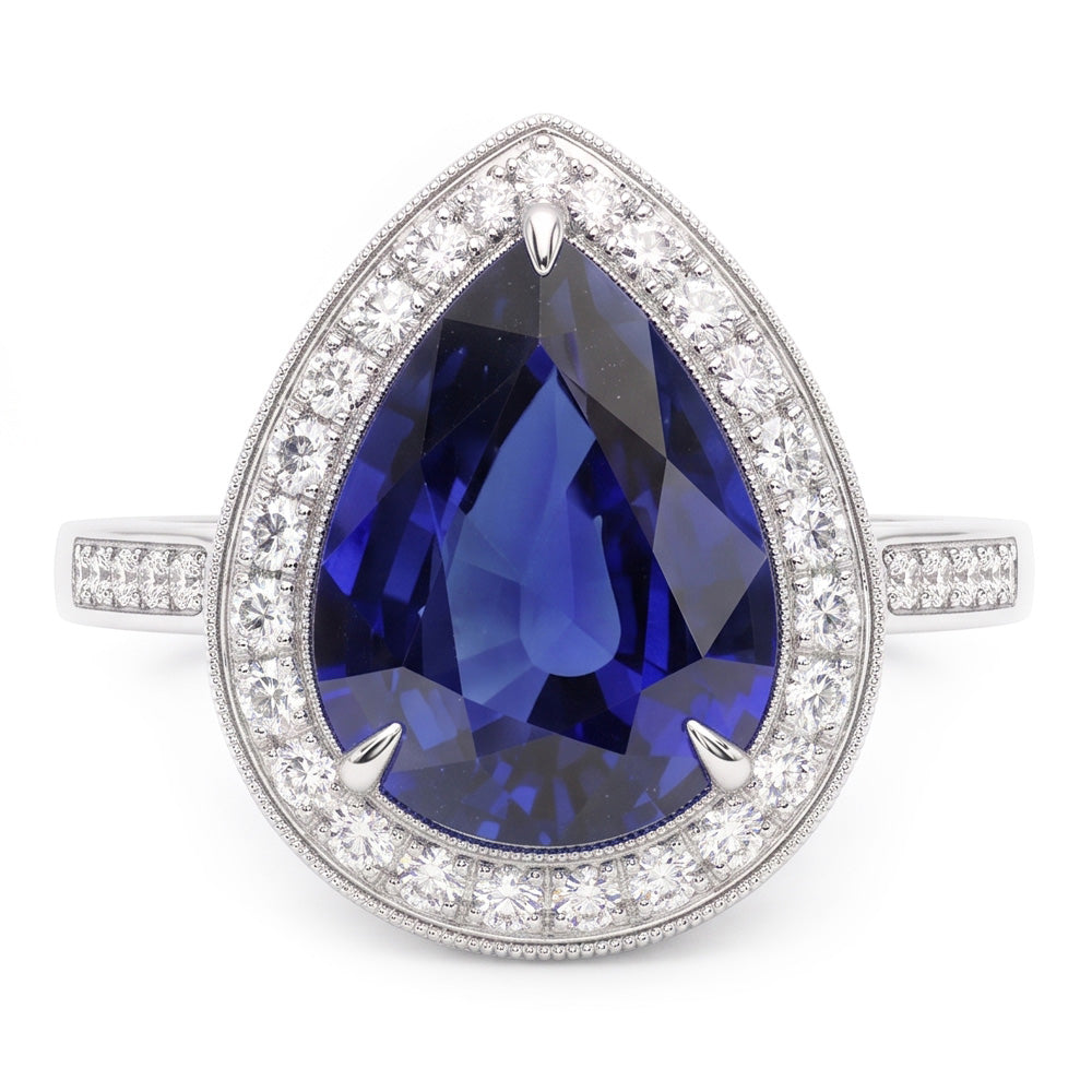 Anello Halo con pera di zaffiro blu da 2,50 carati e pavé di diamanti in oro bianco 14K