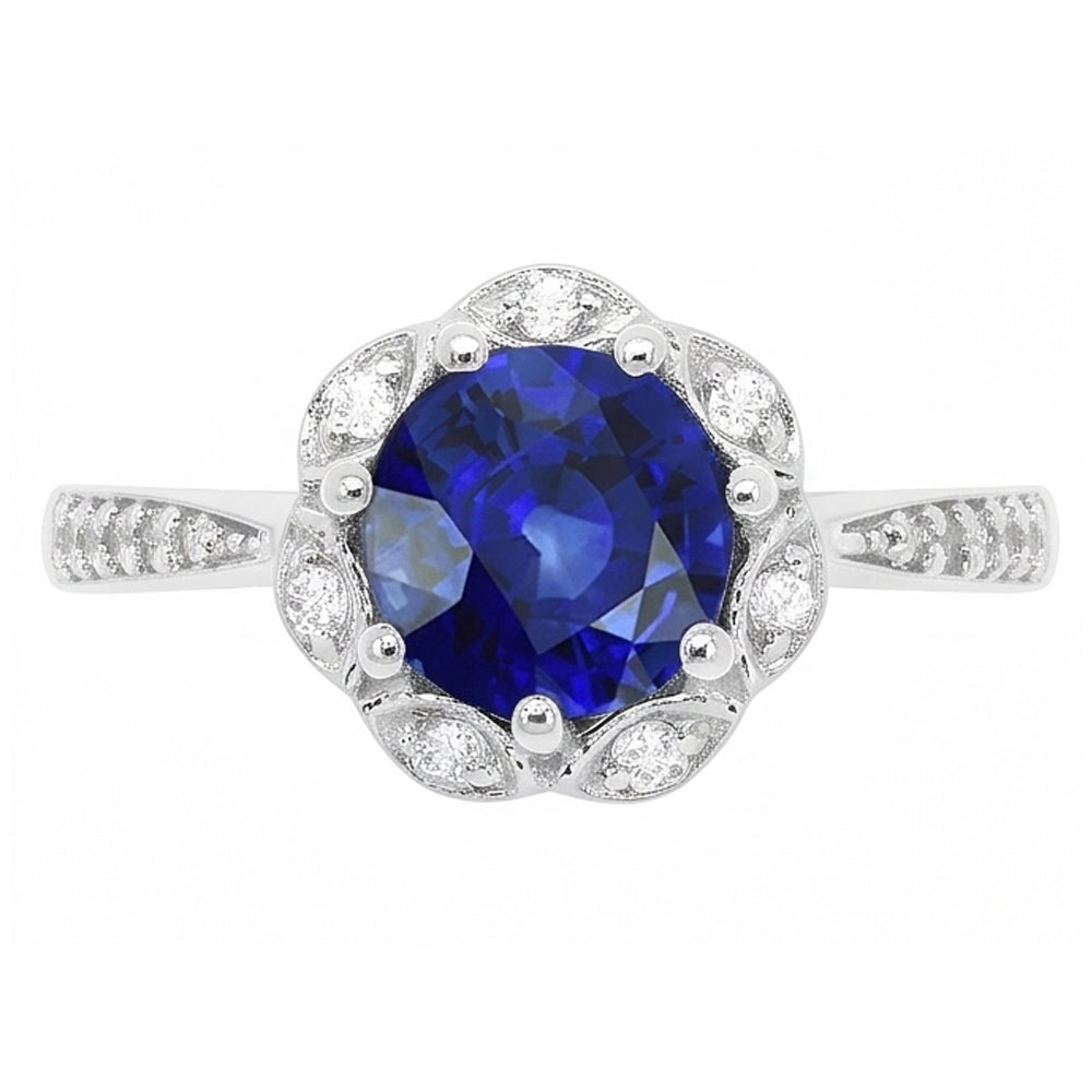 Anello Halo con stelo tondo a forma di fiore di zaffiro da 3 carati e stelo affusolato di diamanti