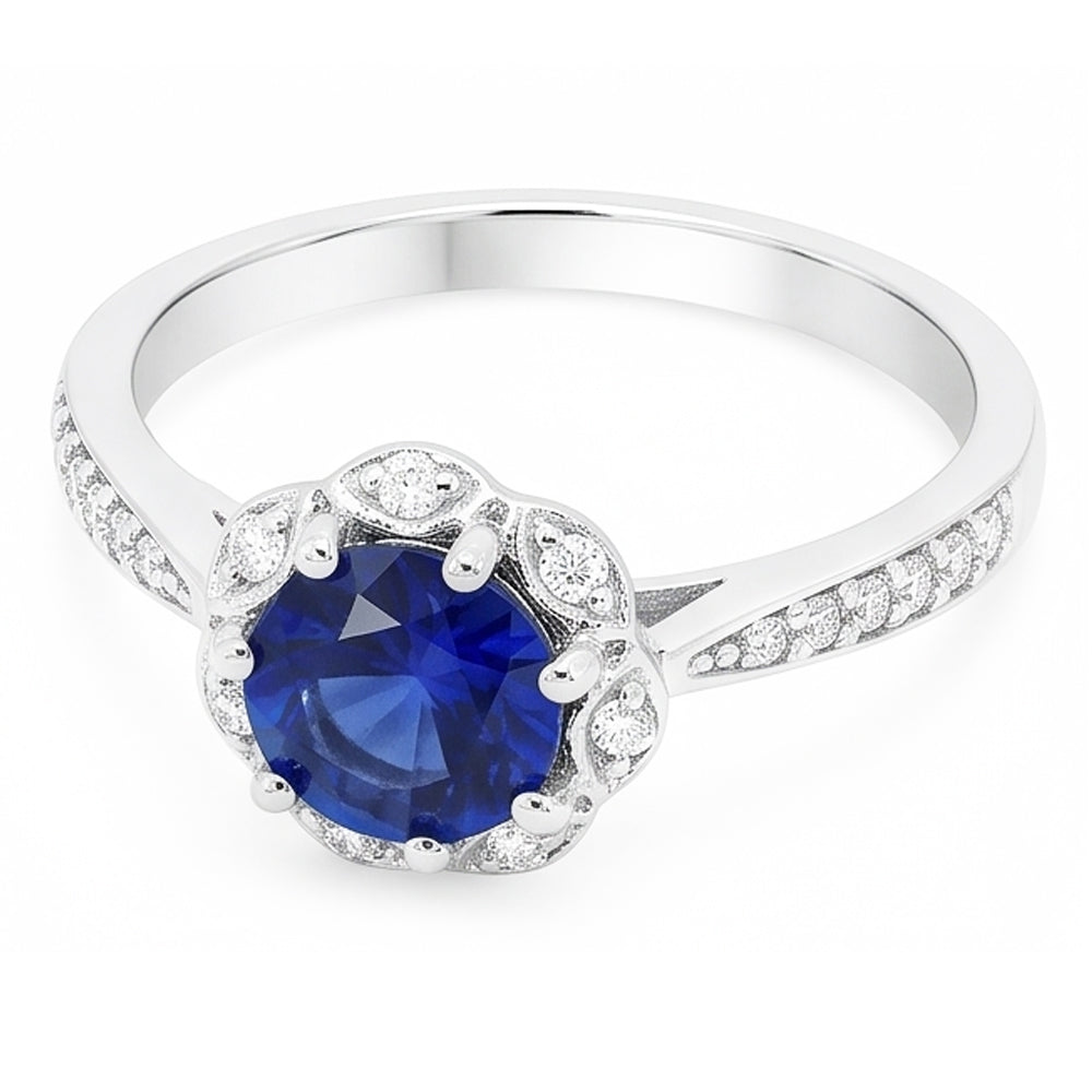 Anello Halo con stelo tondo a forma di fiore di zaffiro da 3 carati e stelo affusolato di diamanti