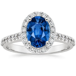 Anello Halo con zaffiro blu di Ceylon. oro bianco 14K. ovale. 2.15 ct.