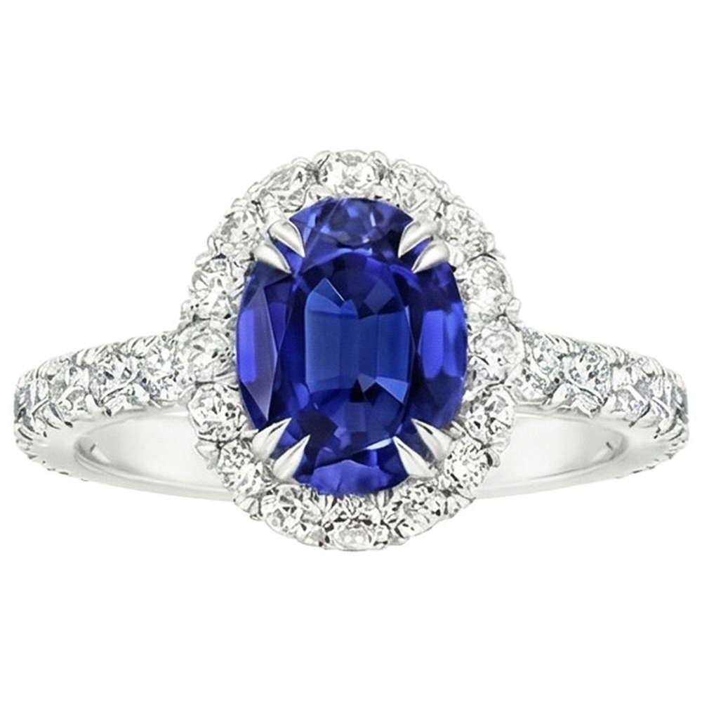 Anello Halo con zaffiro blu intenso ovale da 6,50 carati e set di punte con artiglio di diamanti