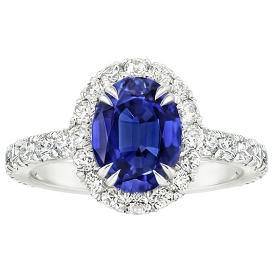 Anello Halo con zaffiro blu intenso ovale da 6,50 carati e set di punte con artiglio di diamanti