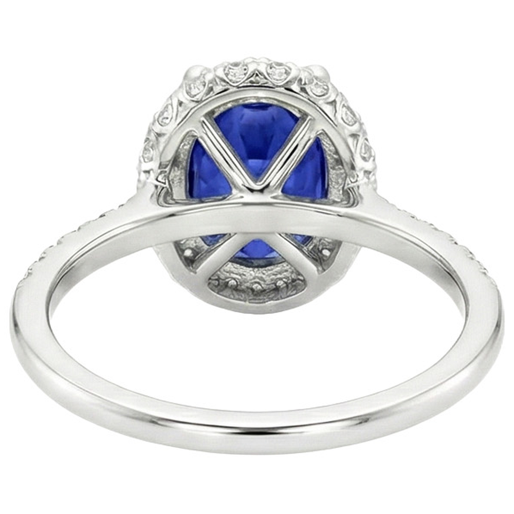 Anello Halo con zaffiro blu taglio ovale 3,75 carati e pavé di diamanti in oro bianco 14K