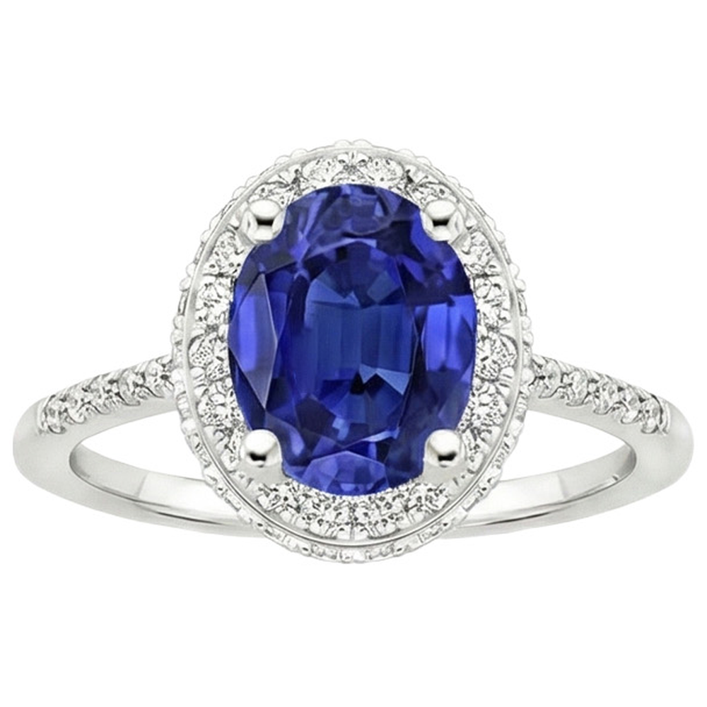 Anello Halo con zaffiro blu taglio ovale 3,75 carati e pavé di diamanti in oro bianco 14K