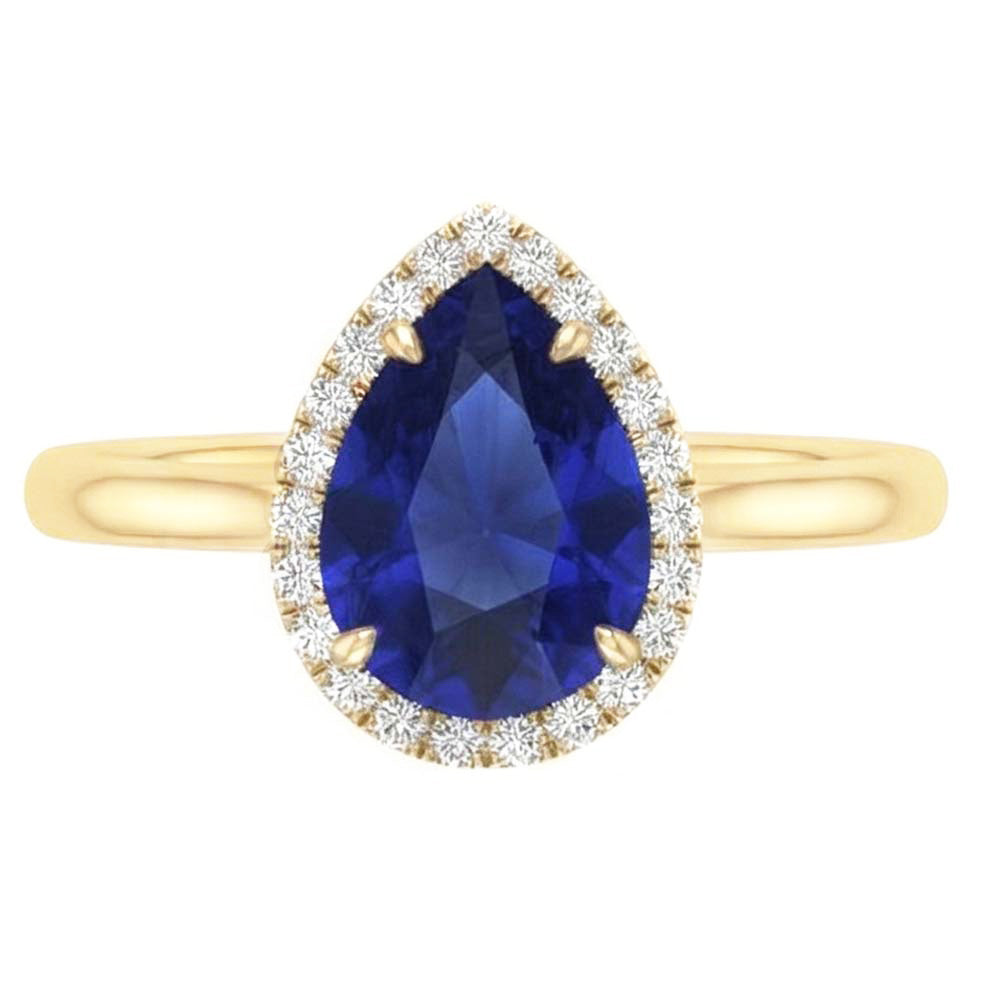 Anello Halo con zaffiro di Ceylon taglio a pera e diamanti. 3 carati a griffe