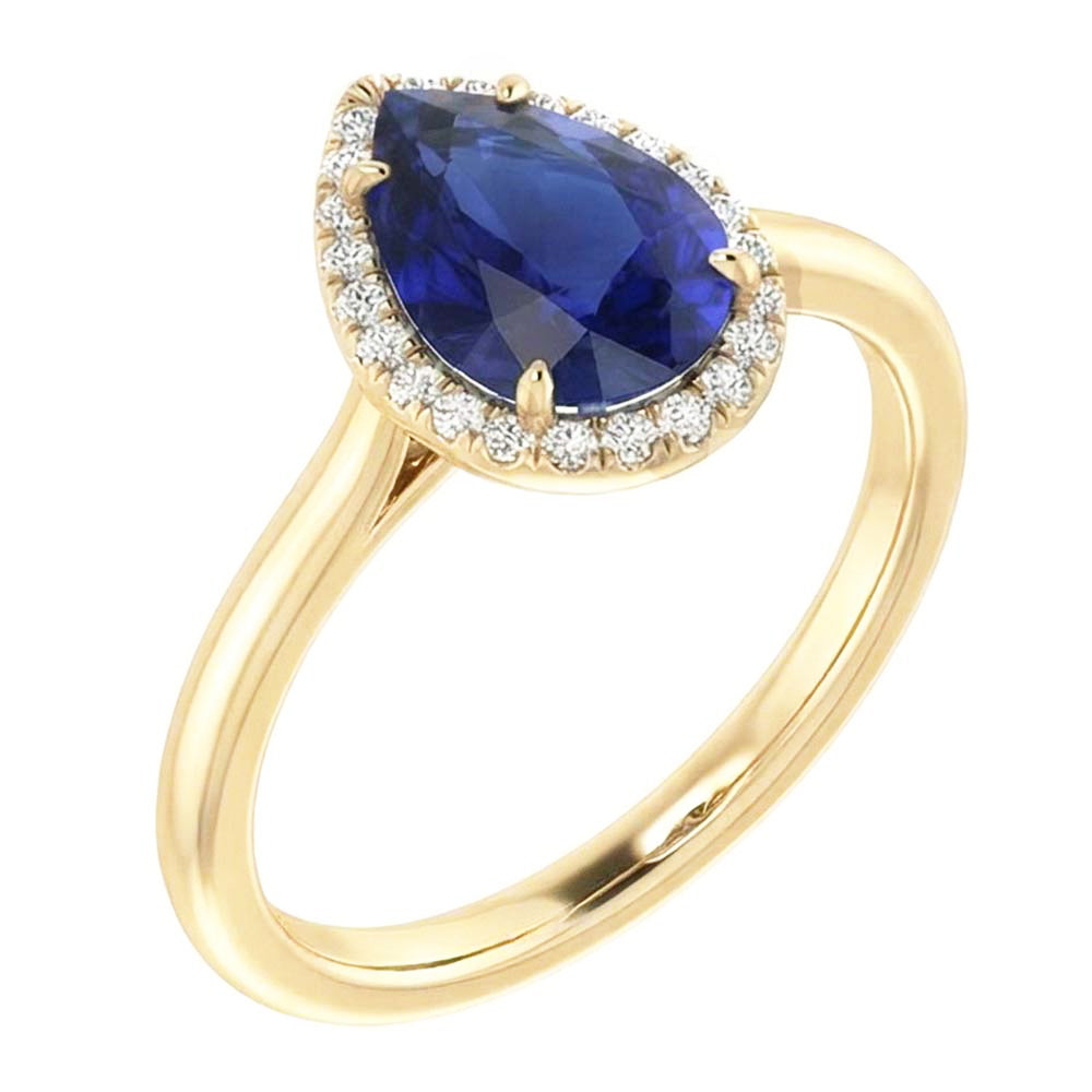 Anello Halo con zaffiro di Ceylon taglio a pera e diamanti. 3 carati a griffe