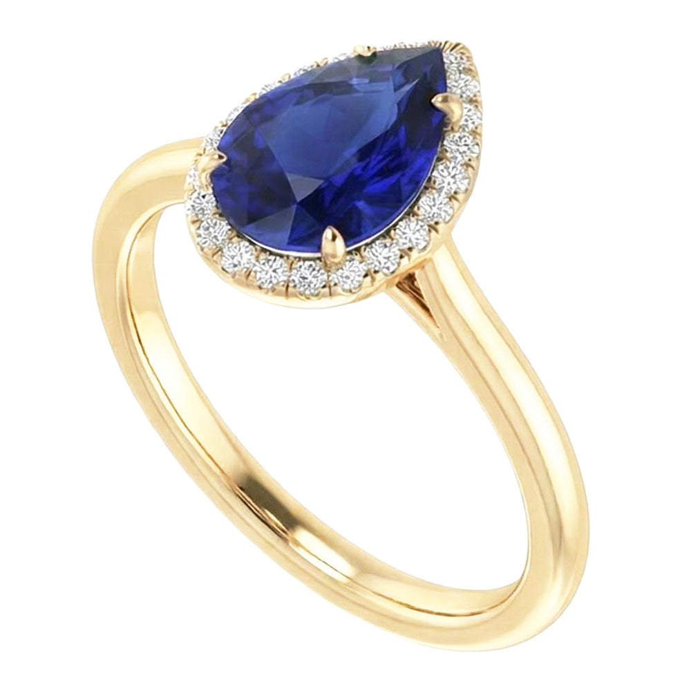 Anello Halo con zaffiro di Ceylon taglio a pera e diamanti. 3 carati a griffe