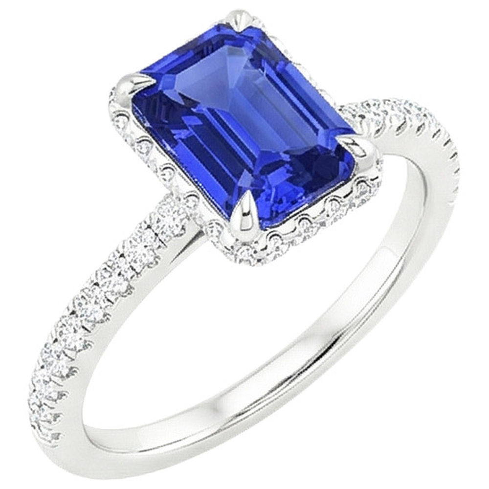 Anello Halo in oro bianco. zaffiro blu smeraldo e diamante 4.25 carati