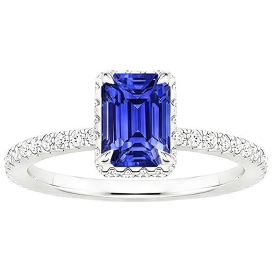 Anello Halo in oro bianco. zaffiro blu smeraldo e diamante 4.25 carati