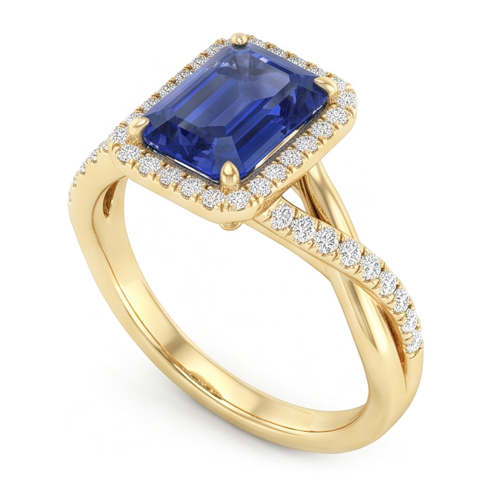 Anello Halo in oro giallo con zaffiro dello Sri Lanka a forma di smeraldo 3 carati