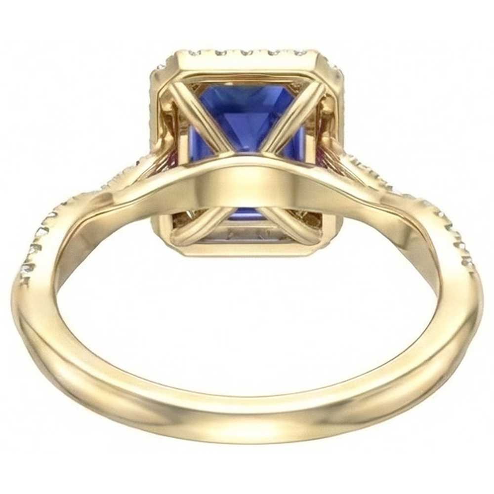 Anello Halo in oro giallo con zaffiro dello Sri Lanka a forma di smeraldo 3 carati