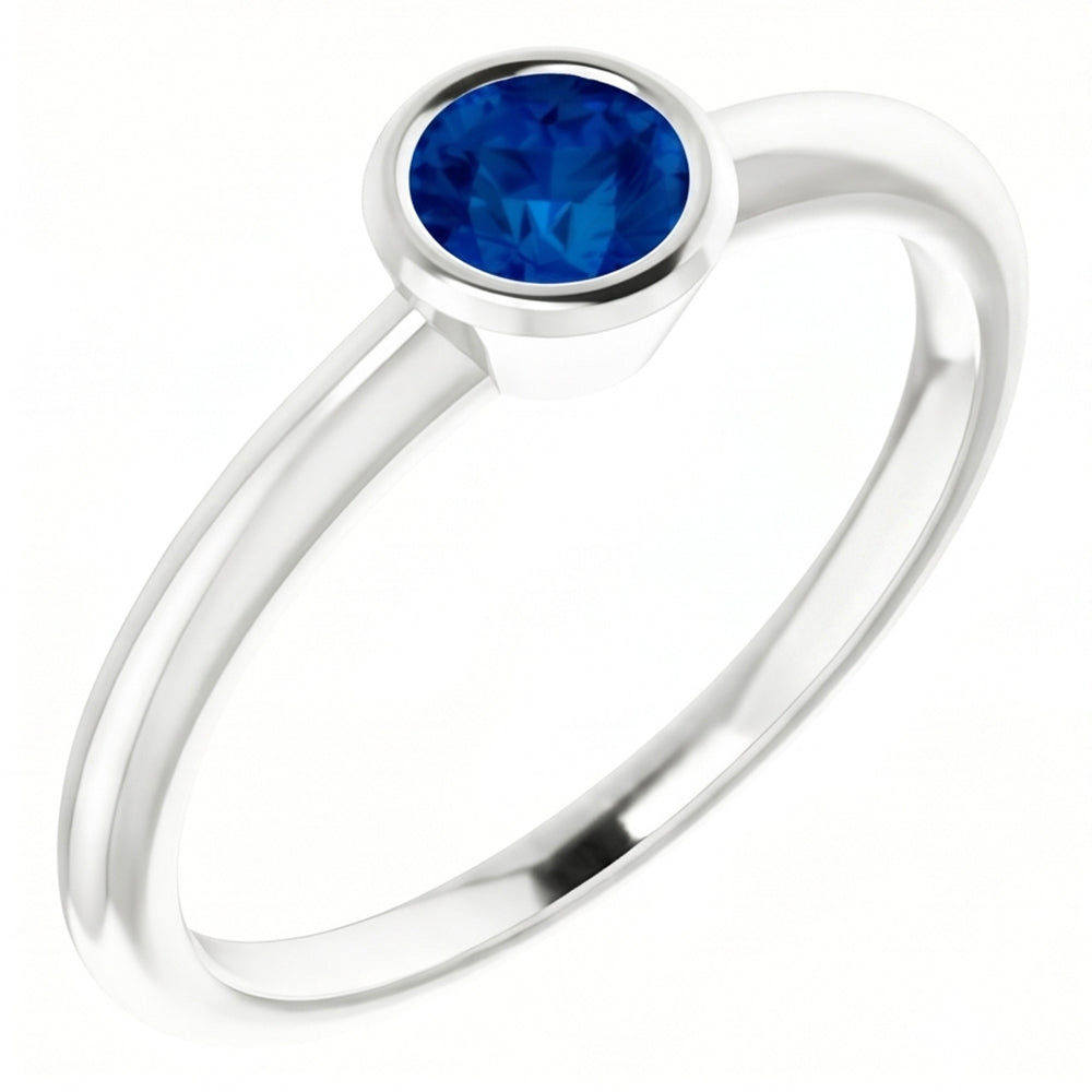 Anello Solitario Zaffiro Blu 0.75 Carati Lunetta Incastonata Oro Bianco 14K