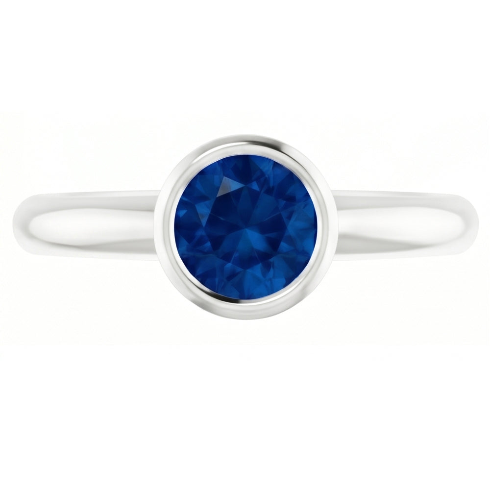 Anello Solitario Zaffiro Blu 0.75 Carati Lunetta Incastonata Oro Bianco 14K
