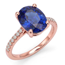 Anello Solitario con zaffiro blu ovale da 4,50 carati e pavé di diamanti