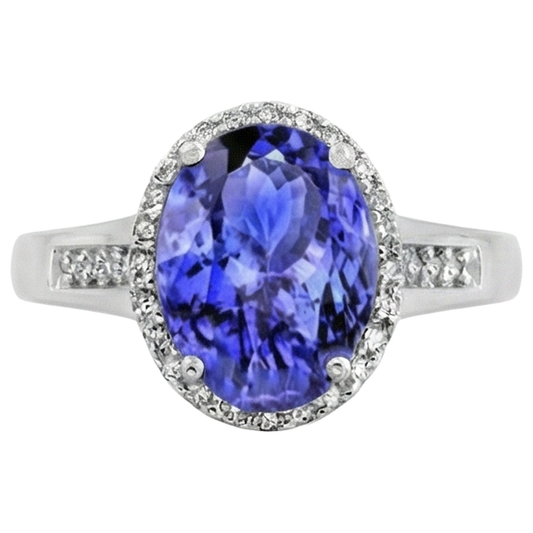 Anello Tanzanite Grande Con Piccoli Diamanti 5.75 Carati Oro Bianco 14K